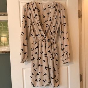 Long-sleeves, pockets, & perfect with black boots